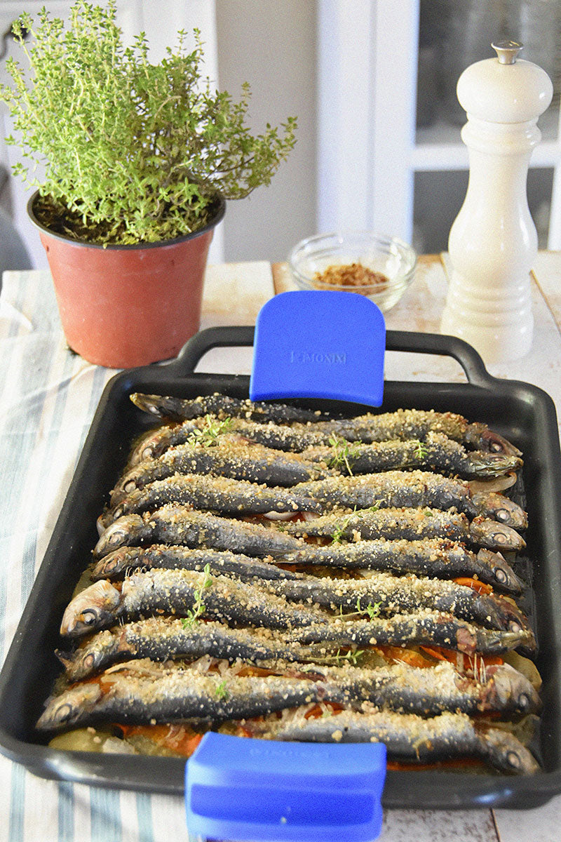 Sardinas rellenas al horno en cama de patatas