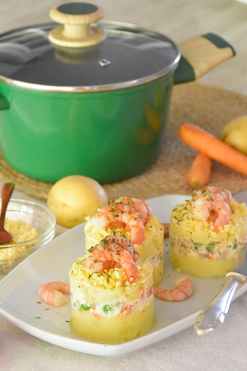 Timbal de patata con langostinos