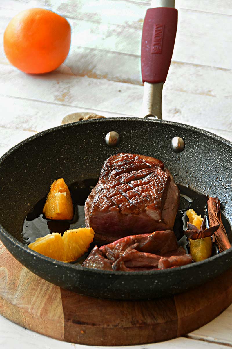 Magret de pato con salsa de naranja y jengibre